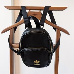 Adidas Mini Black Leather Backpack.